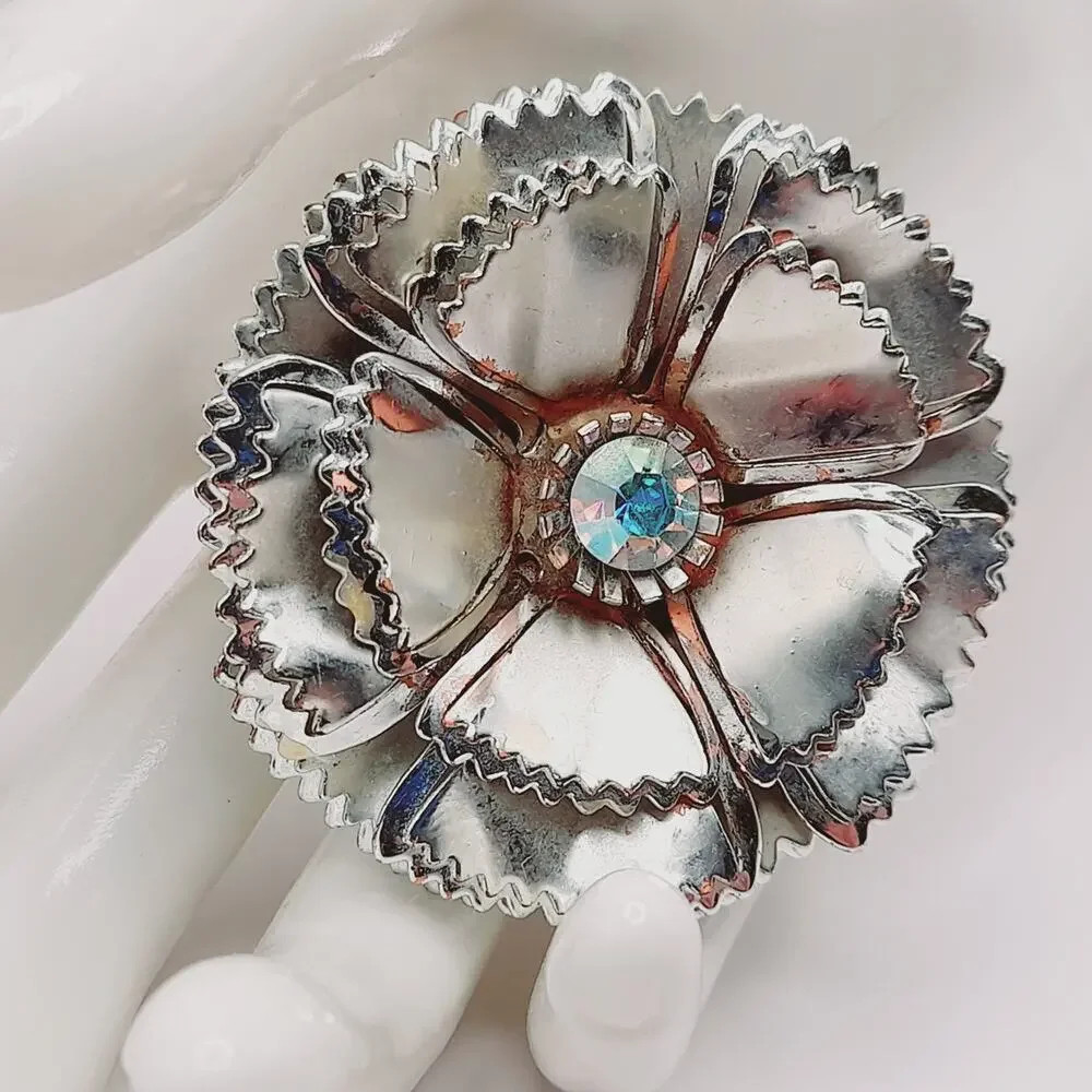 Vintage Silver Tone Flower Brooch with AB Rhinestone Center Reflective Floral